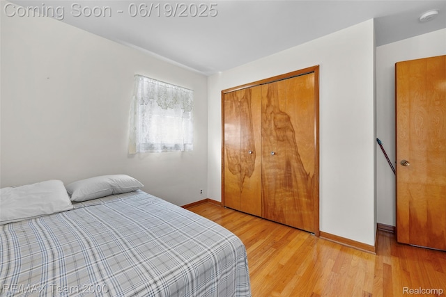 6514 Maple St, Dearborn, MI 48126 - bedroom featuring light wood-type flooring and a closet