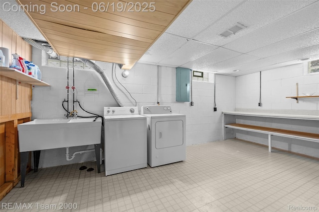 6514 Maple St, Dearborn, MI 48126 - laundry area featuring washer and dryer and electric panel