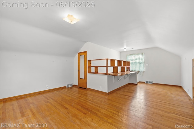 6514 Maple St, Dearborn, MI 48126 - bonus room with lofted ceiling and light wood-style flooring