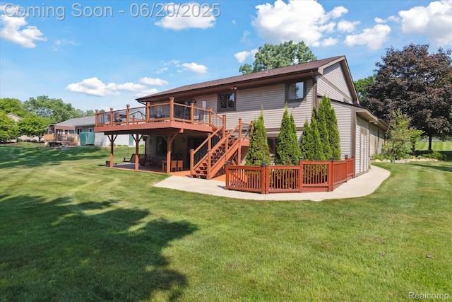 2386 Sherlock Trl, Highland, MI 48356 - back of house featuring a deck, stairway, a yard, and a patio area