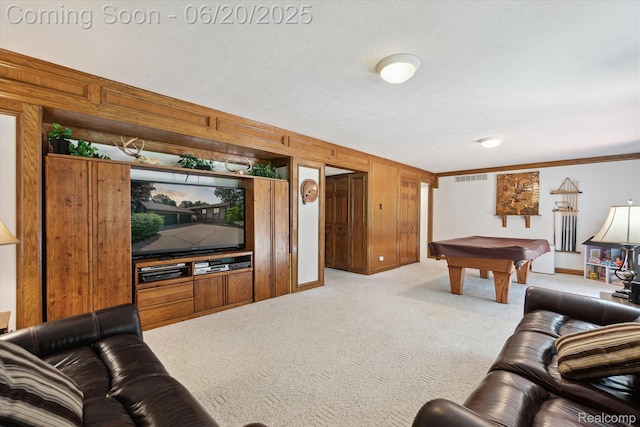 2386 Sherlock Trl, Highland, MI 48356 - living area with billiards, light carpet, wooden walls, and ornamental molding