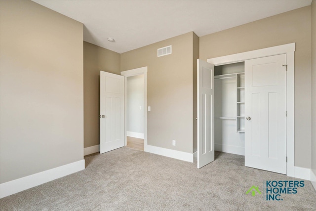 1827 Stratford Ln NW, Grand Rapids, MI 49534 - unfurnished bedroom with carpet flooring and a closet