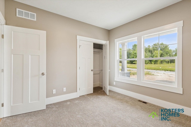 1827 Stratford Ln NW, Grand Rapids, MI 49534 - unfurnished bedroom with carpet and baseboards