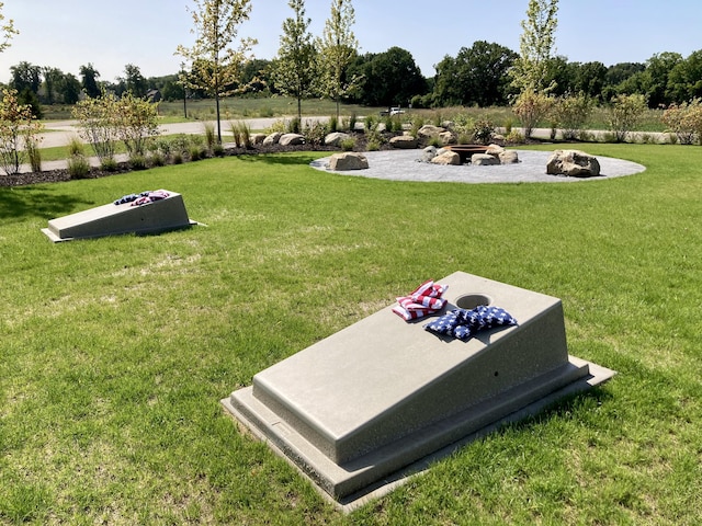 8167 Turning Stone, Kalamazoo, MI 49009 - surrounding community featuring a lawn and an outdoor fire pit