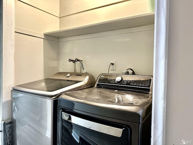 8464 Keitha Dr, Lambertville, MI 48144 - laundry area featuring separate washer and dryer