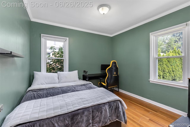 8123 Mckinley, Center Line, MI 48015 - bedroom with wood finished floors, multiple windows, and crown molding