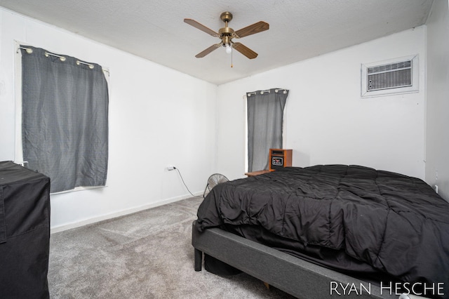 10340 Kartz Rd, Greenville, MI 48838 - bedroom with a wall unit AC, carpet floors, and a ceiling fan