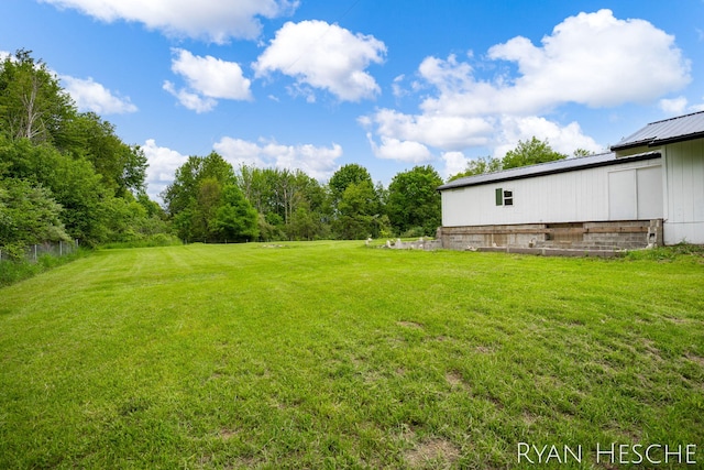 10340 Kartz Rd, Greenville, MI 48838 - view of green lawn with an outdoor structure and an outbuilding