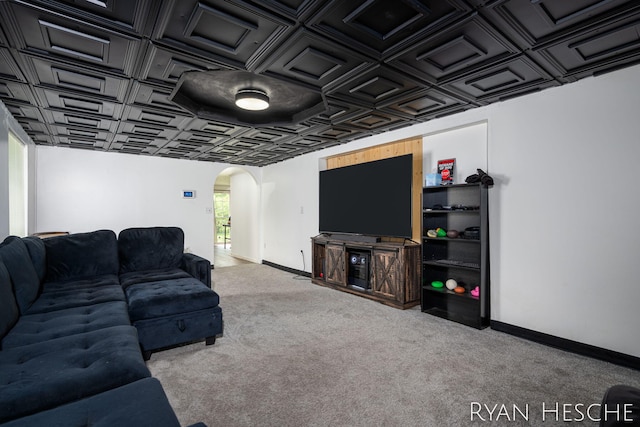 10340 Kartz Rd, Greenville, MI 48838 - living room featuring arched walkways, an ornate ceiling, and carpet