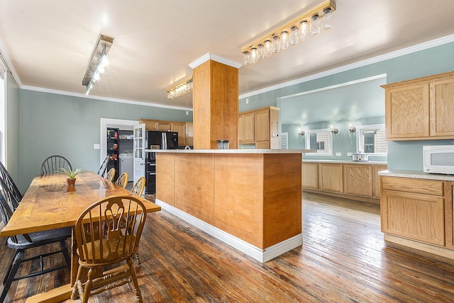 390 W Muskegon Ave, Muskegon, MI 49440 - kitchen with light brown cabinetry, freestanding refrigerator, dark wood-style floors, ornamental molding, and white microwave