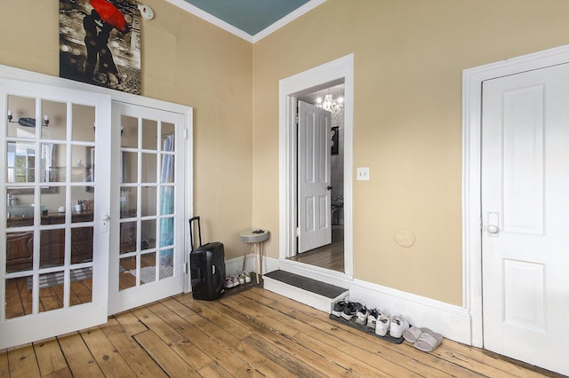 390 W Muskegon Ave, Muskegon, MI 49440 - unfurnished sunroom with a chandelier and french doors