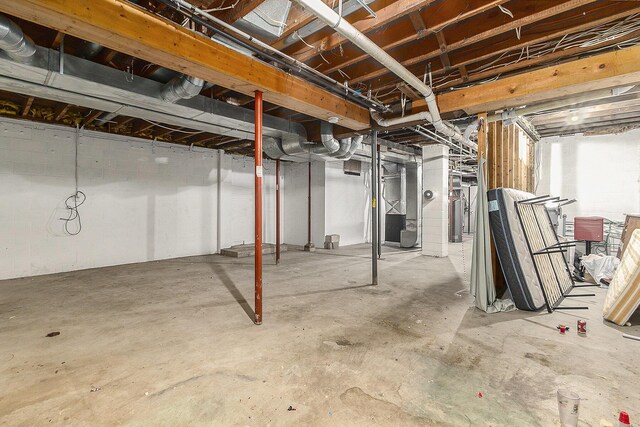 390 W Muskegon Ave, Muskegon, MI 49440 - unfinished basement with water heater