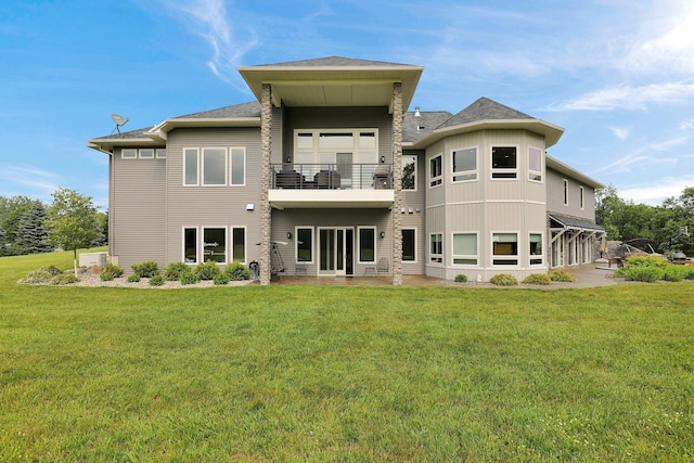 7074 S Ainger Rd, Olivet, MI 49076 - rear view of property featuring a balcony, a lawn, and roof with shingles