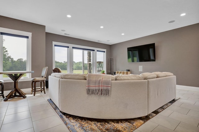 7074 S Ainger Rd, Olivet, MI 49076 - living room with recessed lighting and light tile patterned floors