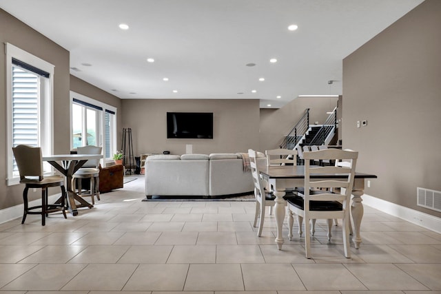 7074 S Ainger Rd, Olivet, MI 49076 - dining space featuring recessed lighting and stairway
