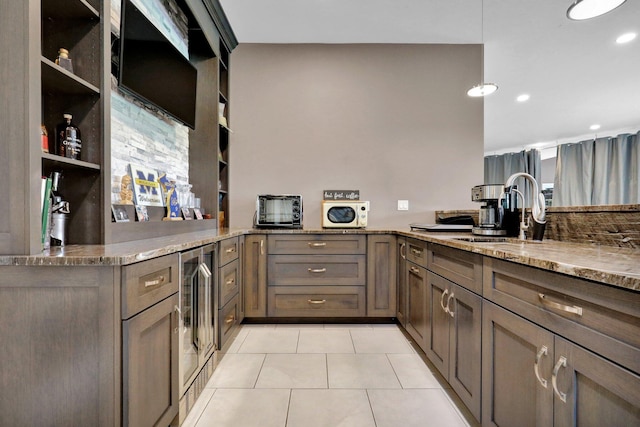 7074 S Ainger Rd, Olivet, MI 49076 - kitchen with light tile patterned flooring, light stone counters, wine cooler, open shelves, and recessed lighting