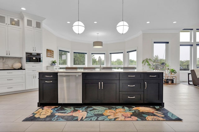 7074 S Ainger Rd, Olivet, MI 49076 - kitchen with dishwasher, white cabinets, healthy amount of natural light, ornamental molding, and recessed lighting