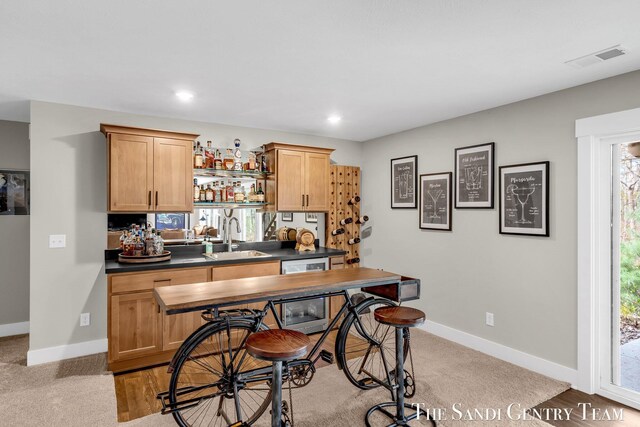 17947 Spring Tree Ct, Spring Lake, MI 49456 - bar featuring recessed lighting, dishwasher, and light colored carpet