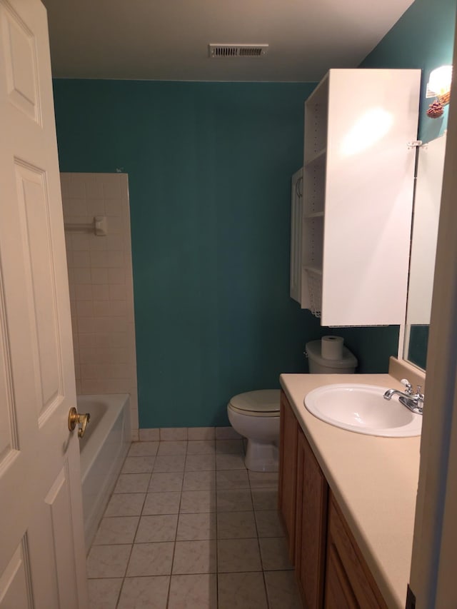 20041 Village Green Ct Unit 14, Brownstown, MI 48183 - full bathroom featuring vanity, a bathtub, tile patterned flooring, and a shower