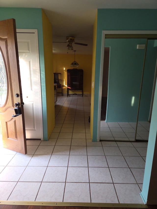 20041 Village Green Ct Unit 14, Brownstown, MI 48183 - foyer entrance featuring light tile patterned flooring and a ceiling fan