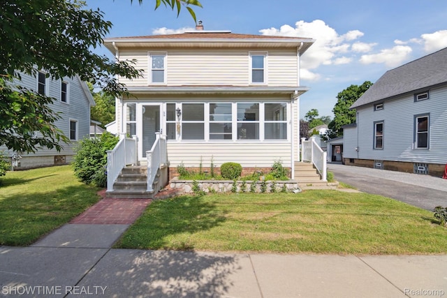 34 Charles St, Hillsdale, MI 49242 - traditional style home with a front lawn