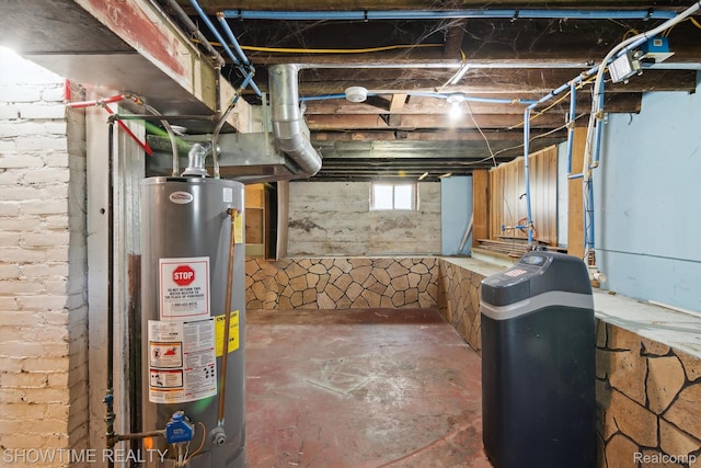 34 Charles St, Hillsdale, MI 49242 - below grade area featuring water heater and a water softener