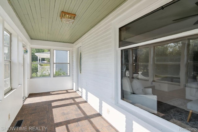 34 Charles St, Hillsdale, MI 49242 - unfurnished sunroom featuring wooden ceiling
