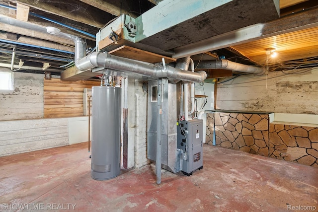 34 Charles St, Hillsdale, MI 49242 - basement featuring water heater and heating unit