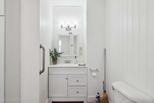 34 Charles St, Hillsdale, MI 49242 - bathroom with toilet and vanity