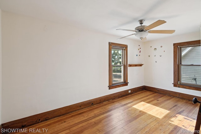 34 Charles St, Hillsdale, MI 49242 - unfurnished room with hardwood / wood-style floors and ceiling fan