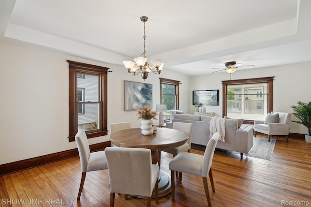 34 Charles St, Hillsdale, MI 49242 - dining room with a chandelier and hardwood / wood-style floors