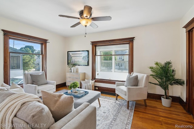 34 Charles St, Hillsdale, MI 49242 - living area featuring wood finished floors and ceiling fan