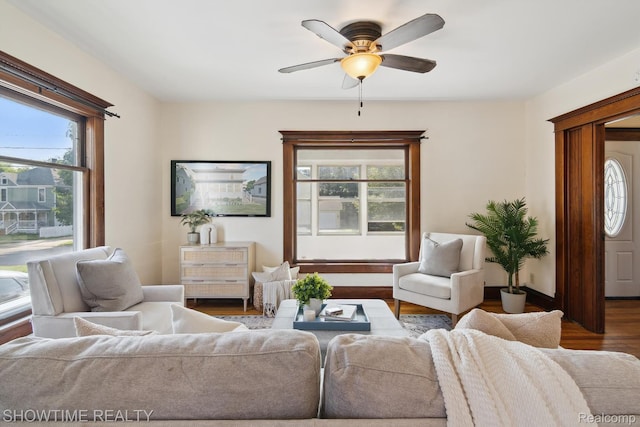 34 Charles St, Hillsdale, MI 49242 - living area with wood finished floors and a ceiling fan