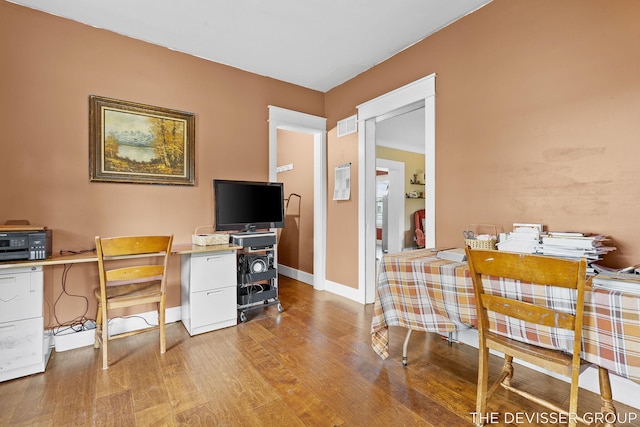 3665 47th St, Hamilton, MI 49419 - home office with wood finished floors and baseboards