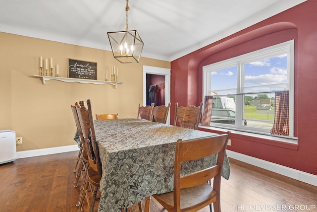 3665 47th St, Hamilton, MI 49419 - dining room featuring a chandelier and wood finished floors