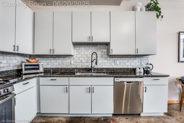 444 W Willis St Unit 211, Detroit, MI 48201 - kitchen with stainless steel appliances, dark stone countertops, and tasteful backsplash