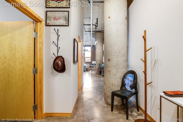 444 W Willis St Unit 211, Detroit, MI 48201 - corridor with baseboards and concrete flooring