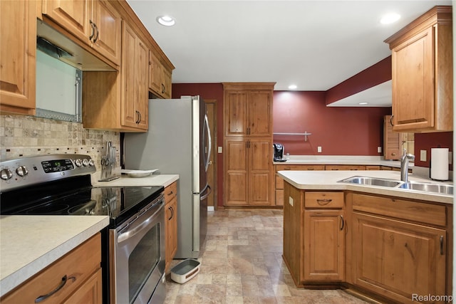 2329 Cumberland Rd, Lansing, MI 48906 - kitchen featuring stainless steel range with electric stovetop, light countertops, stone finish floors, tasteful backsplash, and recessed lighting