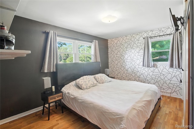 2329 Cumberland Rd, Lansing, MI 48906 - bedroom featuring wood finished floors and baseboards