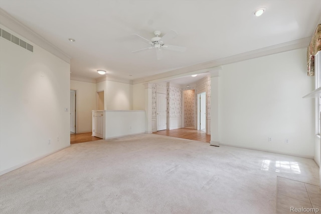 1921 Dunham Dr, Rochester, MI 48306 - empty room featuring a ceiling fan, crown molding, and light carpet