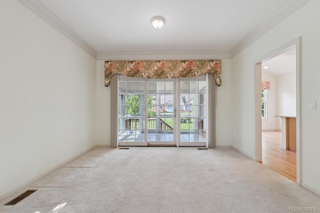 1921 Dunham Dr, Rochester, MI 48306 - carpeted empty room featuring crown molding and baseboards