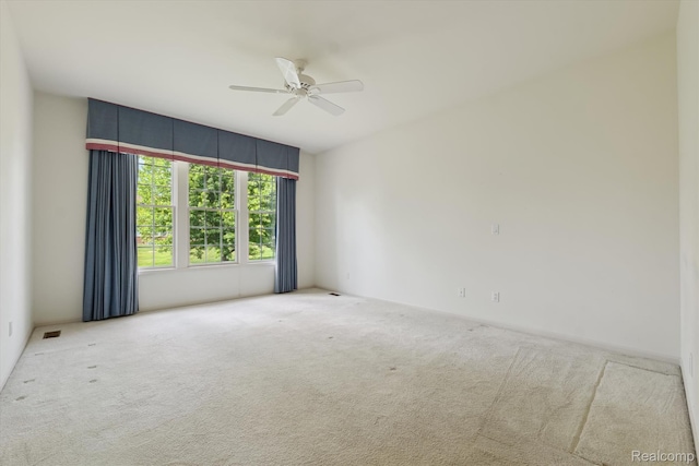1921 Dunham Dr, Rochester, MI 48306 - spare room featuring carpet floors and ceiling fan