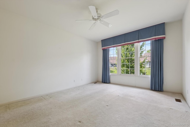 1921 Dunham Dr, Rochester, MI 48306 - spare room with carpet floors and a ceiling fan