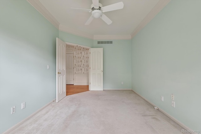 1921 Dunham Dr, Rochester, MI 48306 - unfurnished bedroom with crown molding, carpet, and a ceiling fan