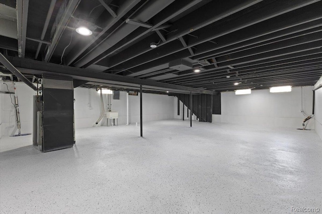 12115 Newburgh Rd, Livonia, MI 48150 - finished basement featuring heating unit and drainage system