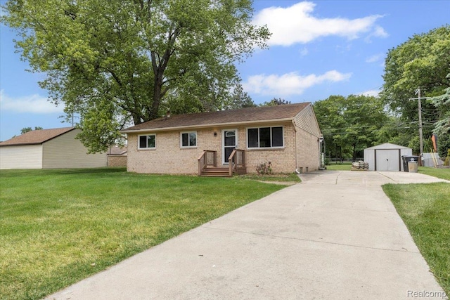 12115 Newburgh Rd, Livonia, MI 48150 - ranch-style home featuring a shed, brick siding, concrete driveway, and a front yard