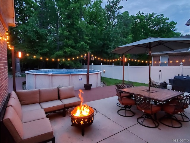29390 Juniper St, Trenton, MI 48183 - view of patio featuring an outdoor living space with a fire pit and outdoor dining space