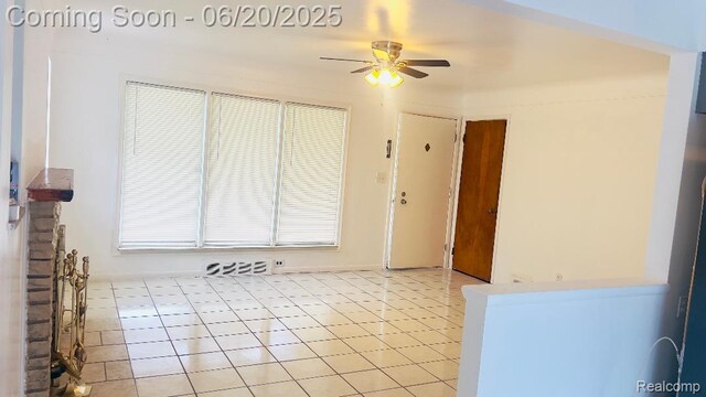 23930 Eureka Ave, Warren, MI 48091 - unfurnished living room featuring ceiling fan and light tile patterned floors