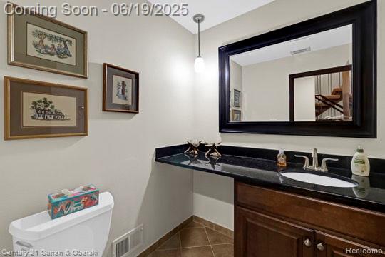 7190 Pebble Park Dr, West Bloomfield, MI 48322 - bathroom featuring vanity and tile patterned flooring