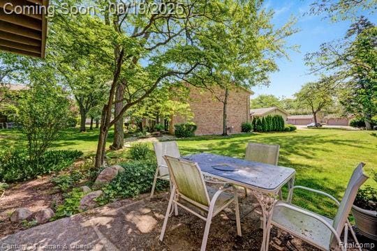 7190 Pebble Park Dr, West Bloomfield, MI 48322 - view of patio featuring outdoor dining area